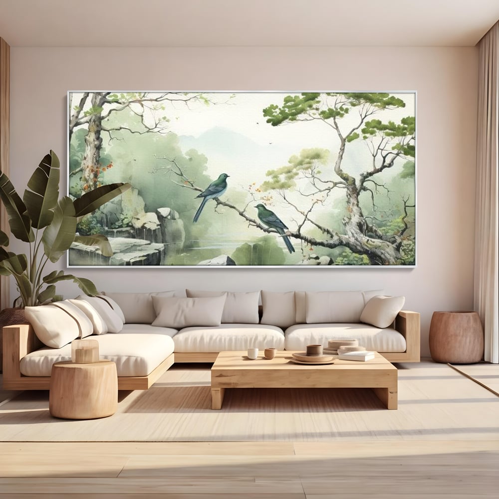 Tablou canvas cu tablou canvas cu pasari pe creanga si peisaj zen, in rama de aluminiu argintiu, pe perete intr-un living
